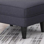 Fauteuil et repose-pieds de club Correia